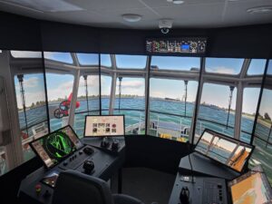 Simulator station within Multraship and Novatug’s new training center, including 240-degree and 360-degree simulator environments, VR and mobile training stations, and the instructor control station. © Multraship